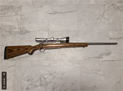 Rugger M77 Mark II, 30-06, Stainless, 22 inch barrel with Bausch & Lomb Elite 3000 3-9x40mm Scope